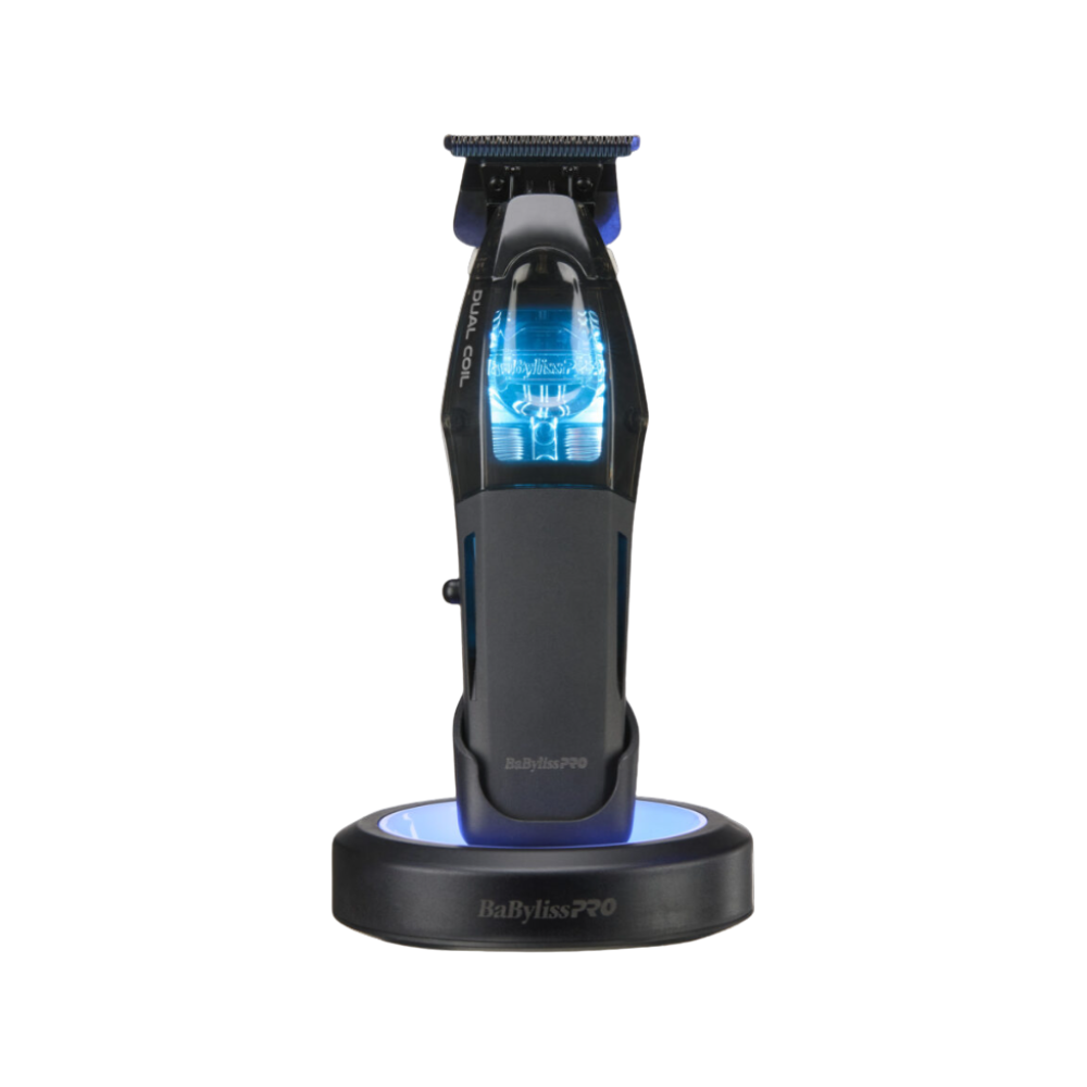 Hair trimmer with blue light on a white background